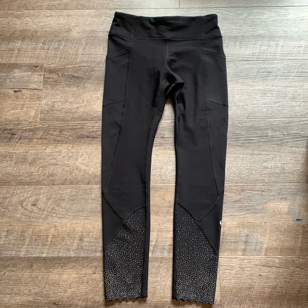 Lululemon Women’s Tight Stuff 23” inseam tight, black, size 4